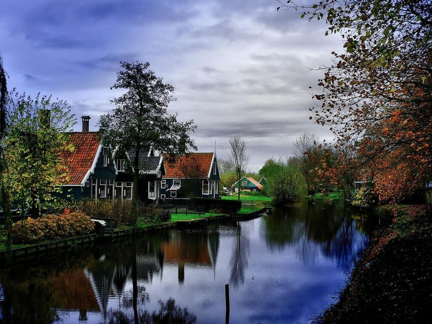 Amsterdam: Windmills E-Bike Tour to Zaanse Schans - Seeing how Dutch clogs and cheese are made