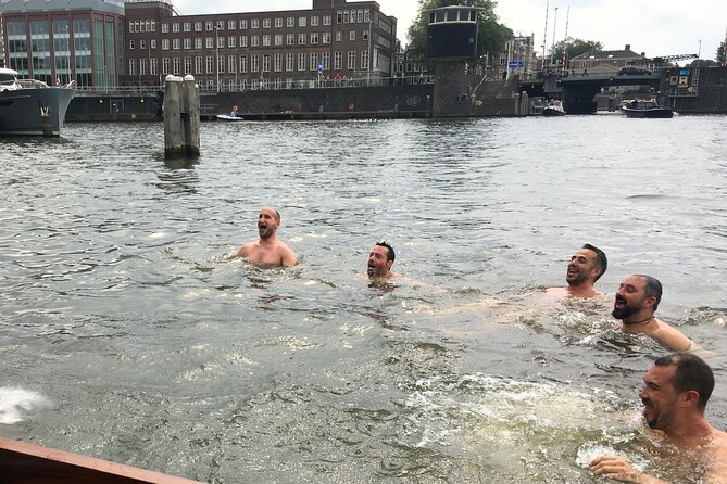Cruise Amsterdam like a Local — Small Group 12 pax - Stopera, Dancing Houses, and Amsterdam’s odd angles
