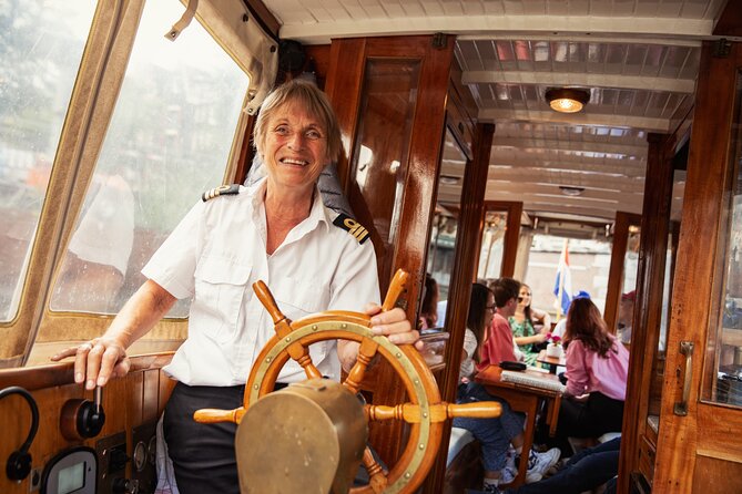 Eating Amsterdam: Food Tour & Canals Cruise - Herring and Kibbeling at Vishandel Centrum
