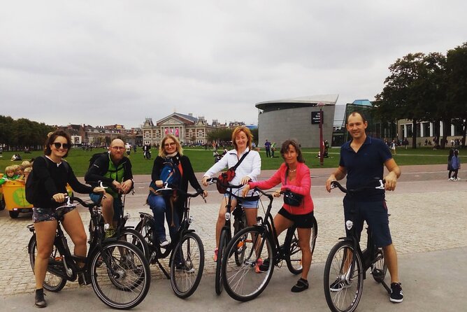 Explore Amsterdam by Bike in the Company of a French Local Guide - Begijnhof: A Calm Courtyard in the Center