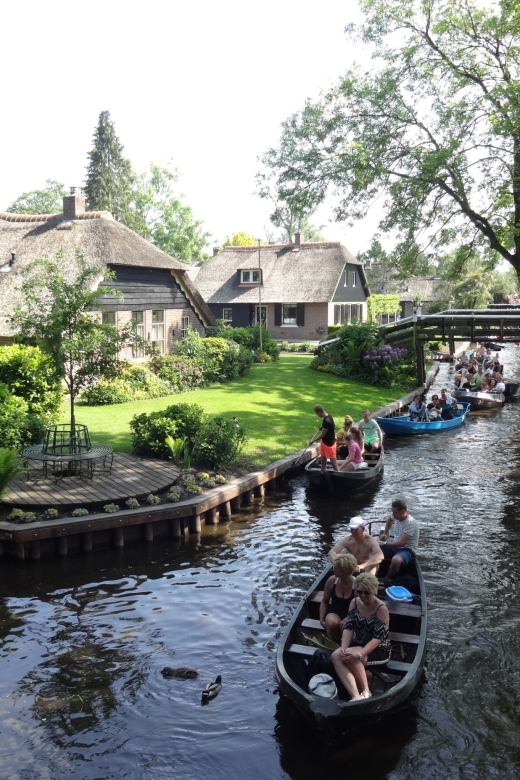 From Amsterdam: Giethoorn Day Trip with Small Electric Boat - The one-hour electric boat through Giethoorn
