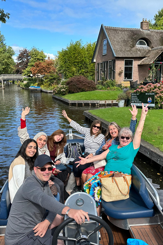 From Amsterdam: Giethoorn Small Group Tour with Boat Ride - The small boat ride through thatched village streets