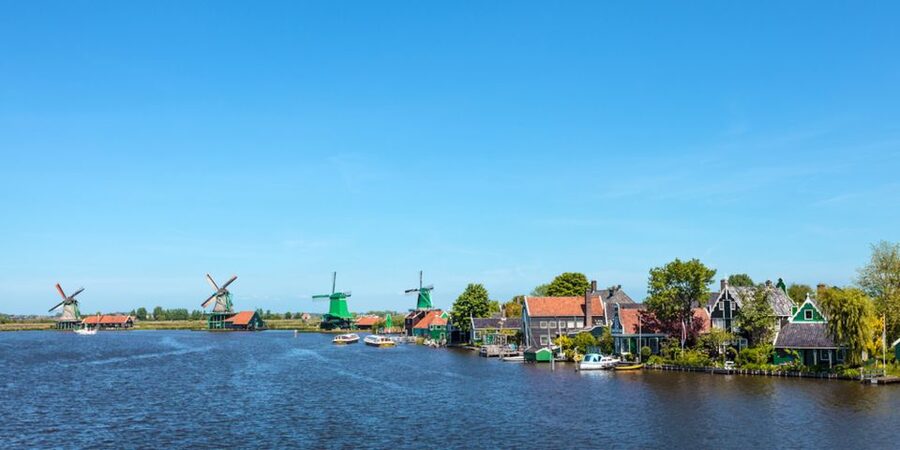 From Amsterdam: Windmills of Zaanse Schans Tour - Meeting at De Ruijterkade 153 in Amsterdam