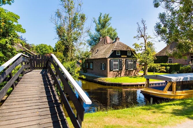 Giethoorn and Afsluitdijk Day Trip from Amsterdam with Boat Trip - The 1.5-hour coach ride from Amsterdam