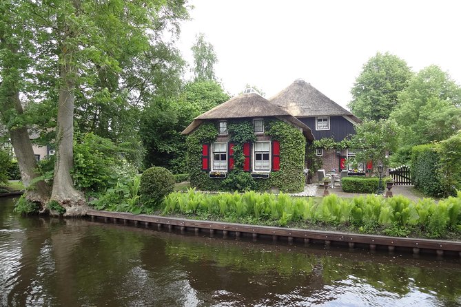Giethoorn Day Tour from Amsterdam with Small Boat Ride - The included small electric boat ride