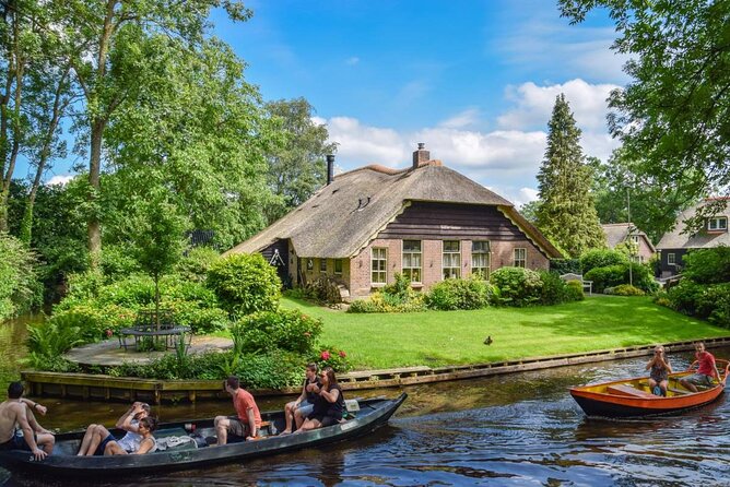 Giethoorn Day Trip from Amsterdam With Cruise and Cheeseplatter - Meeting at De Ruijterkade 105 at 10 a.m.