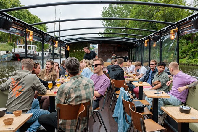 Groningen: Terrace Boat Experience with a Cozy Bar: 1.5 Hours - Central Station, a grand view from the canal