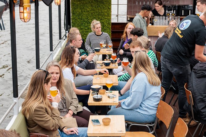 Groningen: Terrace Boat Experience with a Cozy Bar: 1.5 Hours - Peerd van Ome Loeks and a local symbol