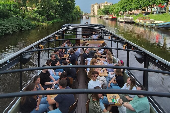 Groningen: Terrace Boat Experience with a Cozy Bar: 1.5 Hours - Groningen Museum and a bold canal-side building