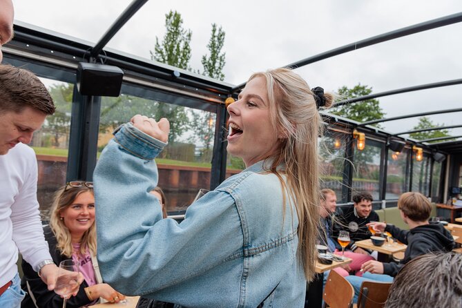 Groningen: Terrace Boat Experience with a Cozy Bar: 1 hour - Groningen Central Station from the Canal