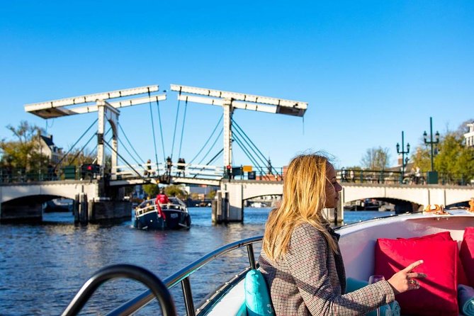 Guided Amsterdam Canal Cruise – Snacks & Drinks on board(1 Hour) - The Oude Kerk and a quiet place in the Red Light District
