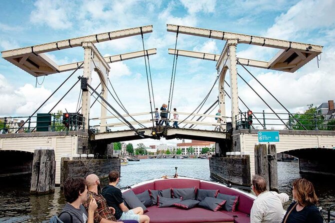 Guided Amsterdam Canal Cruise – Snacks & Drinks on board(1 Hour) - Maritime power beside the Dutch East India Company ship