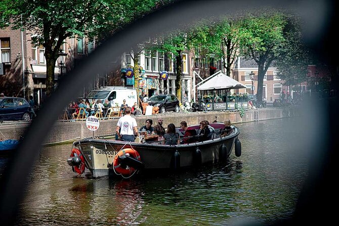 Guided Amsterdam Canal Cruise – Snacks & Drinks on board(1 Hour) - The Jewish quarter and Amsterdam’s difficult stories