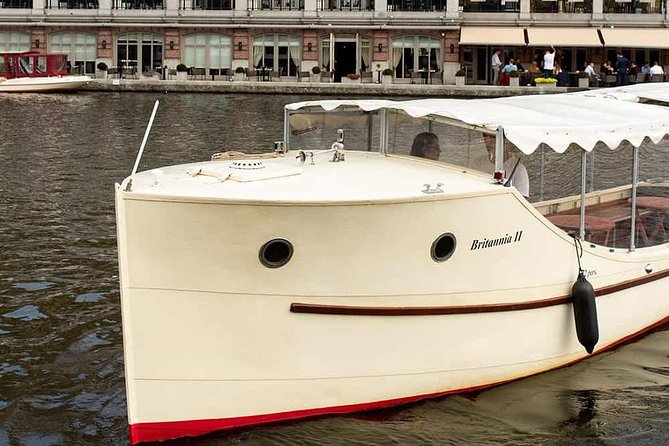 Guided Amsterdam Canal Cruise – Snacks & Drinks on board(1 Hour) - A green view from the water at Hortus Botanicus