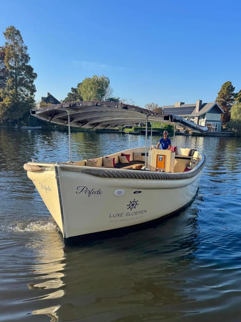 Haarlem: Guided Highlights Canal Cruise on Open Boat - What the guiding feels like in practice