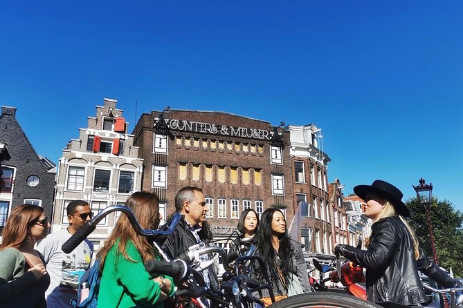 Humans of Amsterdam: Cultural Walking Tour incl. meeting 2 locals - De Wallen, personal stories, and difficult subjects
