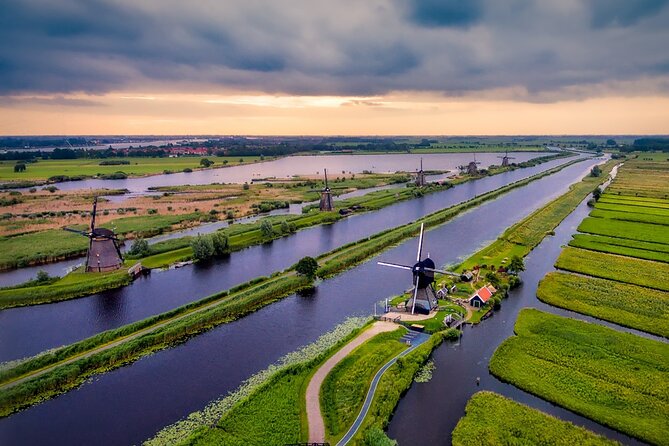 Kinderdijk Windmills and Delft Small-Group Tour from Amsterdam - Kinderdijk: 19 windmills and a 700-year water battle