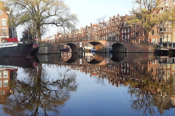 Morning Canal Cruise Amsterdam in Small-Group - Drinks, snacks, and the value of a $52 ticket