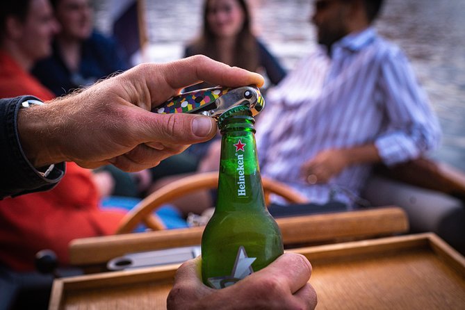 Private Boat Tour Amsterdam - 90 Min incl. welcome drink on historic saloon boat - Guides who make the difference