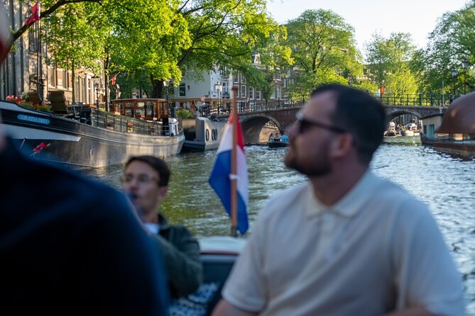 Private Boat Tour Amsterdam - 90 Min incl. welcome drink on historic saloon boat - Drinks, timing, and the onboard minibar