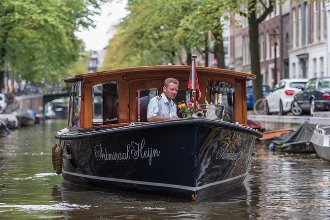 Private boat tour on a electric saloon boat - Why Amsterdam’s canals work so well by boat