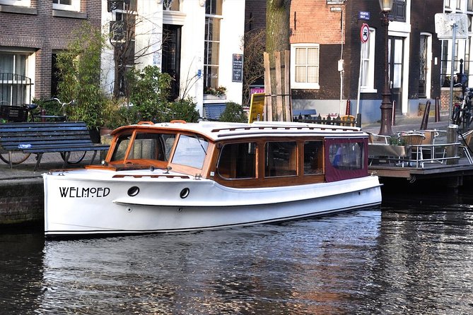 Private Champagne Canal Cruise in Amsterdam - The Amstel River, locks, and Amstel Hotel
