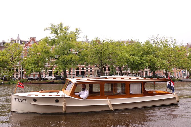 Private Guided Historic Amsterdam Canal Cruise in a Salon Boat - Cruising toward the Amstel
