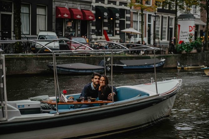 Private Romantic Canal Cruise Amsterdam with Bubbly and Snacks - Houseboats, bridges, and stories made for couples