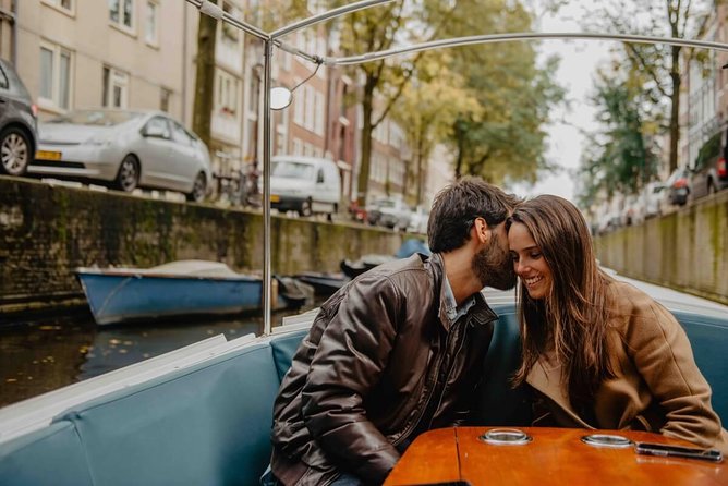 Private Romantic Canal Cruise Amsterdam with Bubbly and Snacks - Comfort in Amsterdam’s changeable weather