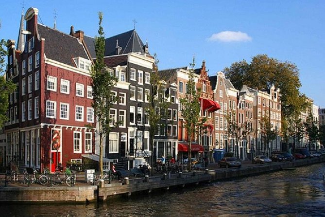 Secrets of Amsterdam Walking Tour plus Dutch Sweets Tasting - Bloemenmarkt, Amsterdam’s floating flower market