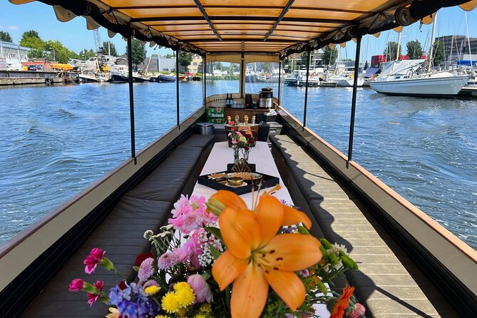 Small-Group Luxury Canal Cruise with Local Skipper - Crooked canal houses near the Amstel