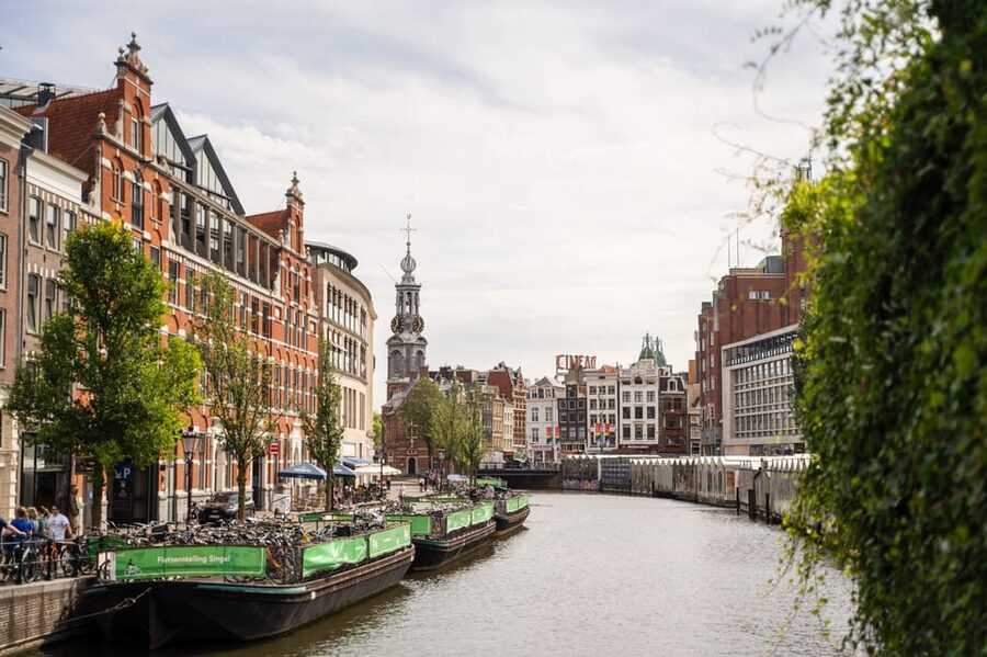 Small-Group Walking Tour with Amsterdam Canal Cruise - Begijnhof, the Flower Market, and Muntplein