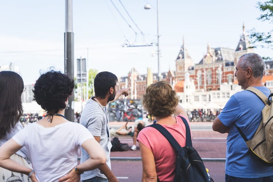 Small-Group Walking Tour with Amsterdam Canal Cruise - Dam Square, the Royal Palace, and the city’s public face