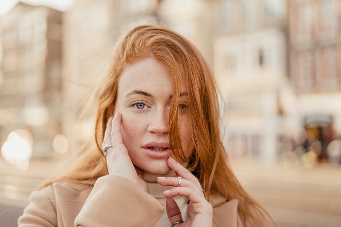Vacation Photoshoot & Tour in Amsterdam - Damrak and Amsterdam’s Familiar Face
