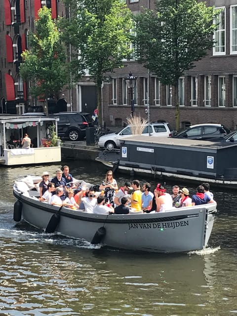Visit Amsterdam by Boat with a French Guide (french) - Why a small electric boat changes the view