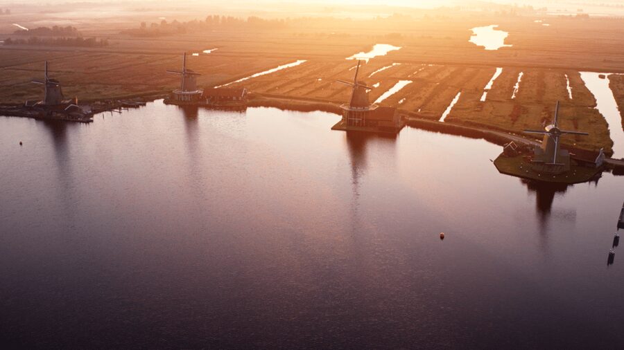 Zaanse Schans: Private Cruise + Live Guide, Optional Drinks - Paintmill De Kat from the water