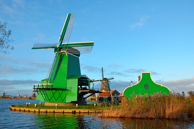 Zaanse Schans Windmills, Cheese and Volendam Tour from Amsterdam - Volendam: Harbor Views and Old Dutch Traditions